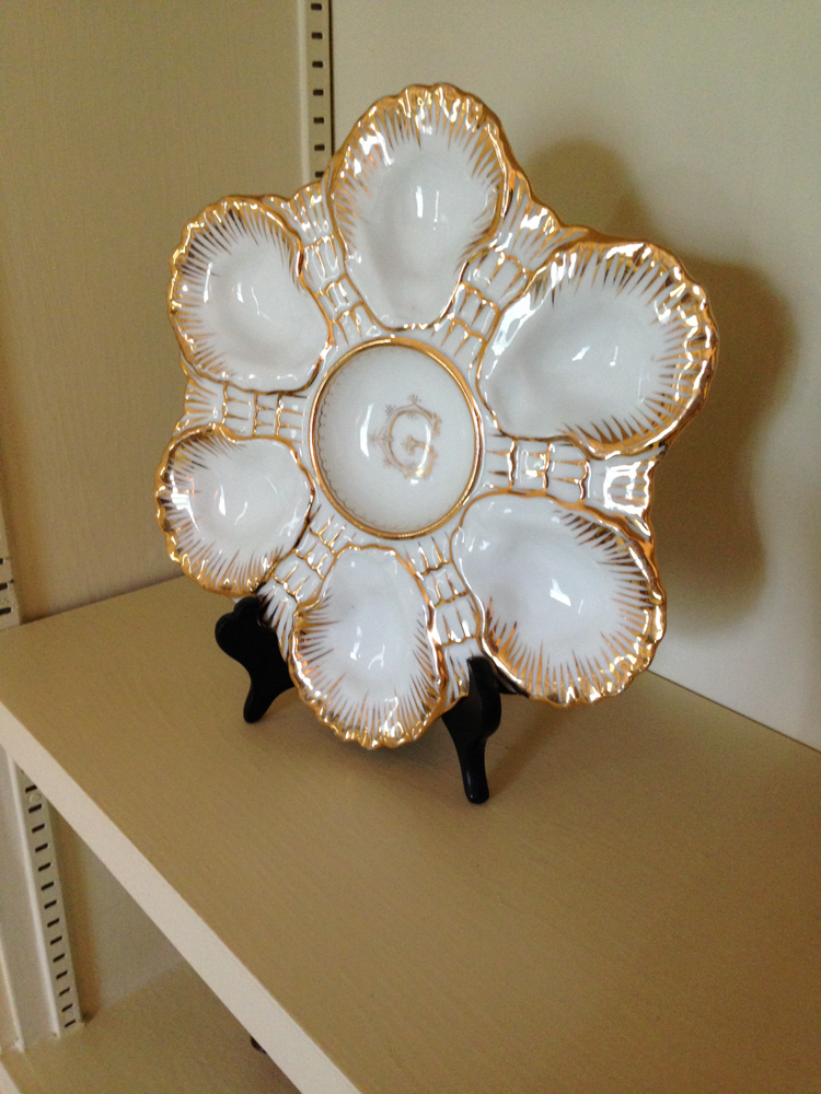 An heirloom monogramed oyster plate belonging to the reporter’s grandmother. Although kosher law forbids eating shellfish, most Jews in Natchez still partake. (Photo by Robin Amer) 